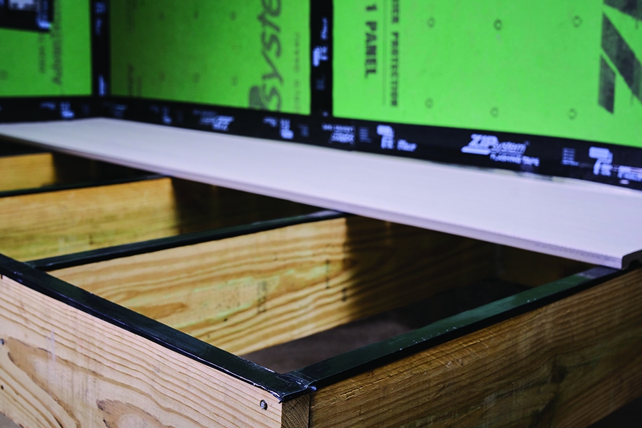 ZIP System multi-purpose tape on deck joists